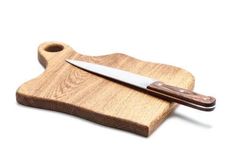 Kitchen Knife Lying On A Cutting Board, White Background Stock Photos