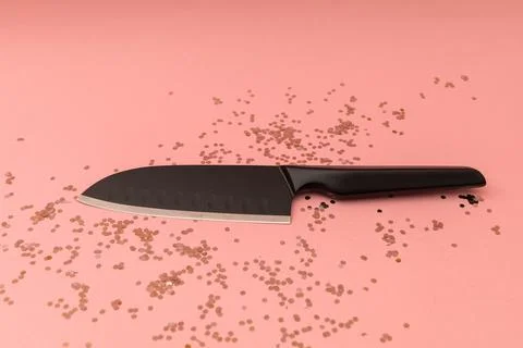 Kitchen knife on pink background Stock Photos
