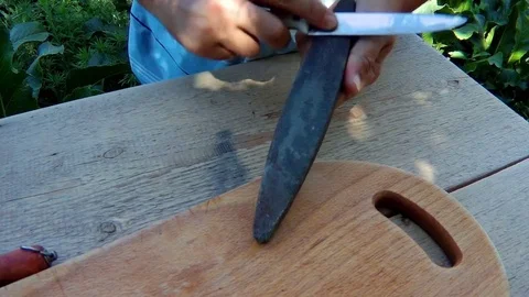 Kitchen knife sharpen Stock Footage 78049786
