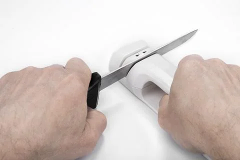 Kitchen Knife sharpener on a white background Stock Photos