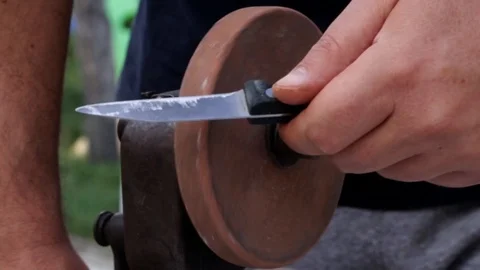 Kitchen knife sharpening with hand cranked sharpener Stock-Footage 116983537