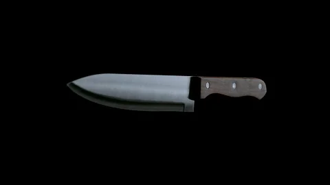 Kitchen Knife Spinning down on Black Background Stock Footage 148489280