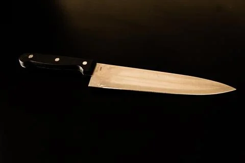 Kitchen knife on the table in the room Stock Photos