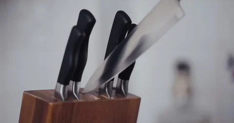 Kitchen Knives Being Handled &amp; Put Back In Block - 4K 24FPS Stock Footage 263137075
