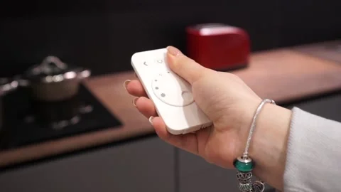 Kitchen light adjustment from the control panel	 Stock Footage 229845537