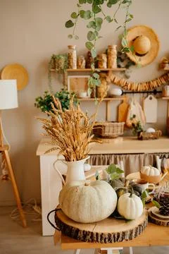 Kitchen is made of wood with elements of eco style. autumn decor. Stock Photos