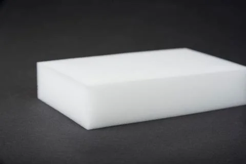 Kitchen melamine sponge on a black background Stock Photos