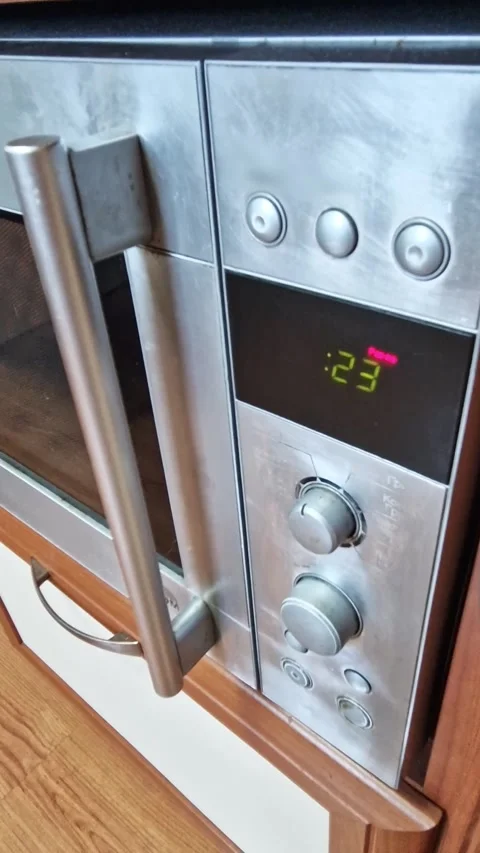 Kitchen Microwave Timer with Red Digital Countdown Stock Footage 323522652