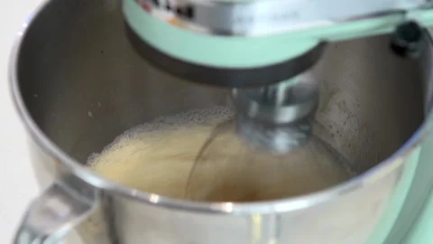 Kitchen mixer. Mix the product in a Stand Mixer. Stock Footage 229844928
