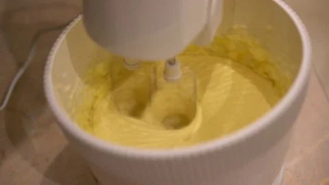 The kitchen mixer mixes the dough Stock Footage 82663961