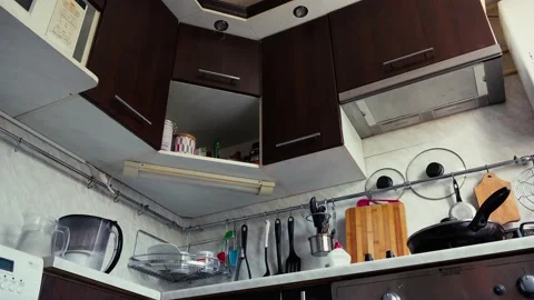 Kitchen of modern apartment with interior in white and grey colors Stock Footage 134712356