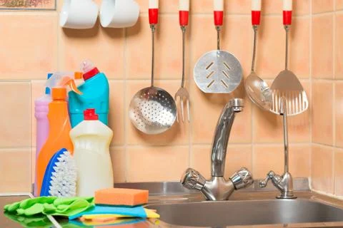 Kitchen objects - tap and cleaning products close up Stock Photos