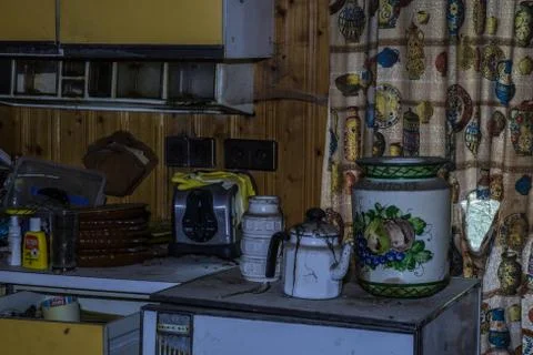 Kitchen with old objects in a house Stock Photos