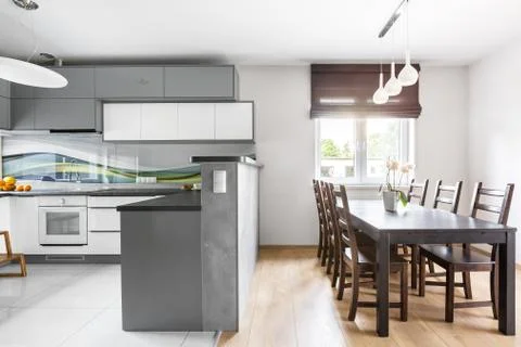 Kitchen open to dining area Stock Photos