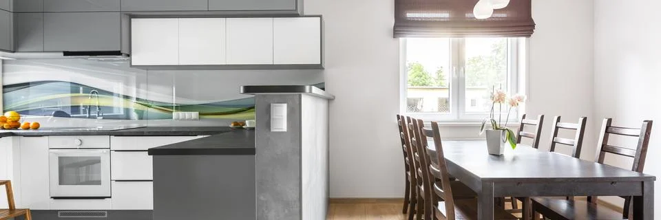 Kitchen open to dining area Stock Photos