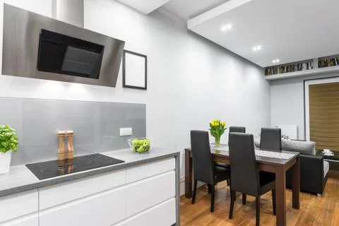 Kitchen open to a dining area Stock Photos