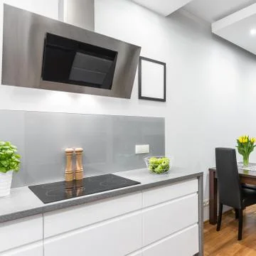 Kitchen open to a dining area Stock Photos