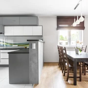 Kitchen open to dining area Stock Photos