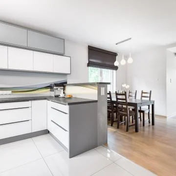 Kitchen open to dining room Stock Photos