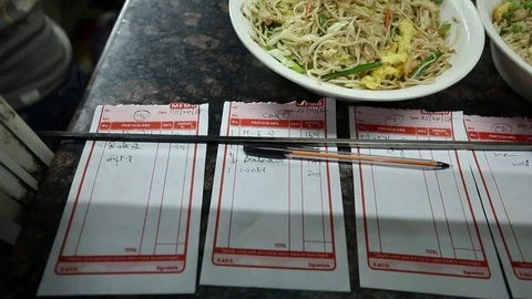Kitchen Order Tickets on Counter Stock Footage 74177144