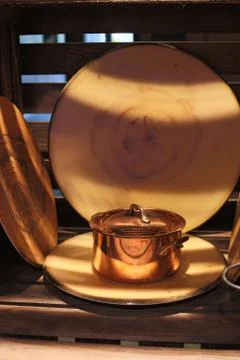 Kitchen pan copper  kitchen tools tree cook shine dishes Stock Photos