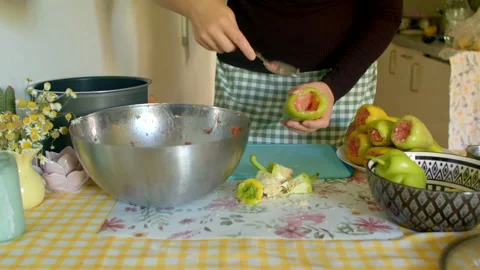 In the kitchen, pears are being expertly cored for delicious fruit preparation Stock Footage 318923279