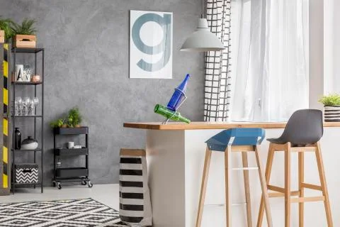 Kitchen with poster and stools Stock-Fotos