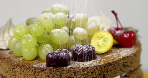 Kitchen recipes. Green grapes on the cake Stock-Footage 119818955