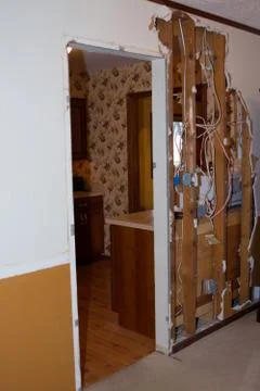 Kitchen Remodel Starting to Tear Down Wall View into Kitchen Por Stock Photos