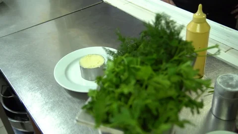 Kitchen. Restaurant. Cooking. The chef decorates the mashed potatoes cherry Video stock 73955479