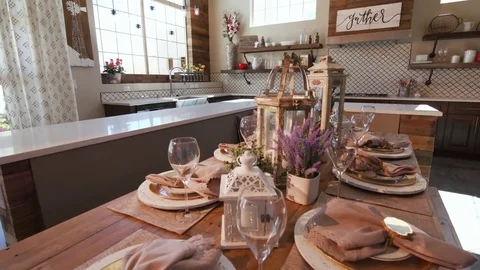 Kitchen Reveal from Low Angle of Dining Table Stock Footage 76256113