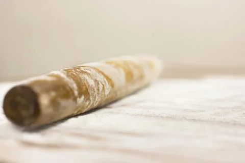 Kitchen rolling pin on flour. Background. To cook Stock Photos