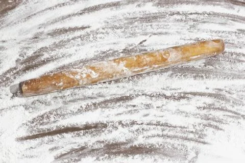 Kitchen rolling pin on flour. Background. To cook Stock Photos