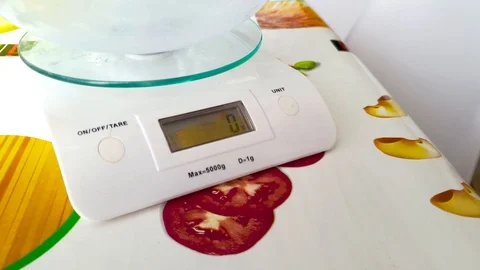 Kitchen scale with digital display Stock Footage 129302989