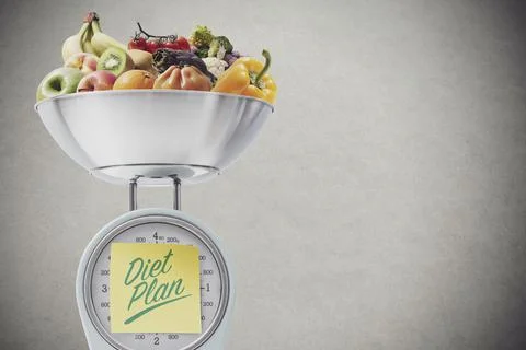 Kitchen scale with greens: diet plan Stock Photos