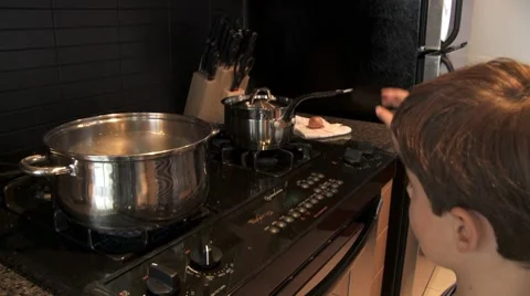 Kitchen scene with child Video stock 8690498