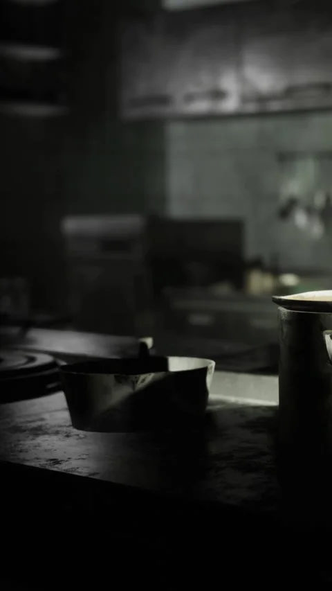 Kitchen scene with cookware and a canister on a dark countertop Stockbeeldmateriaal 332214942