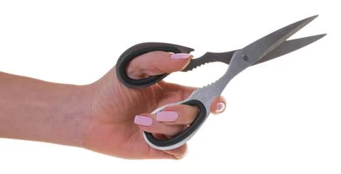 Kitchen scissors in female hand Stock Photos