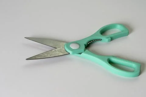 Kitchen scissors on a white background. close-up Stock Photos