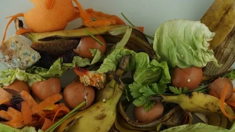 Kitchen scraps, peels and leftovers of fruit and vegetables, bread, eggshells Stock Footage 132768129
