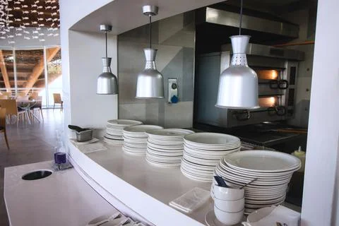 Kitchen serving hatch in a modern design restaurant Stock Photos