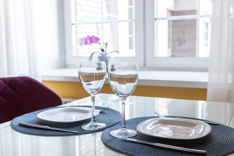 Kitchen, set the table. Beautiful Sunny interior. Stock Photos