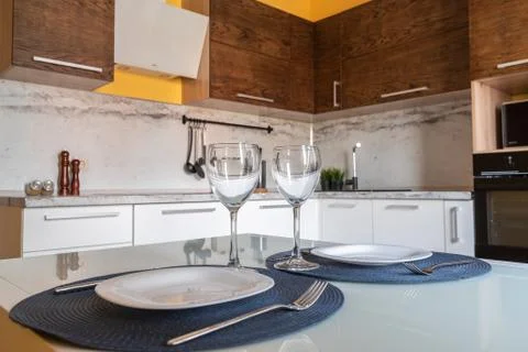 Kitchen, set the table. Beautiful Sunny interior. Stock Photos