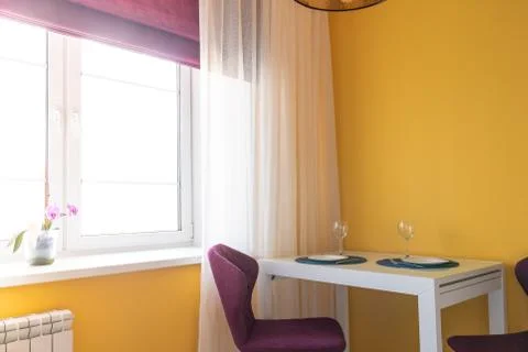 Kitchen, set the table. Beautiful Sunny interior. Stock Photos