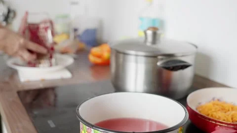 Kitchen Setup With Vegetables And Cooking Utensils, Hands Preparing Vegetables Stock Footage 323627845