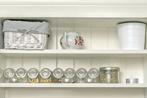 Kitchen shelf with jars. Stock Photos