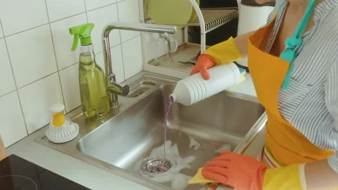 Kitchen Sink Clog: Cleaning with Purple Solution Stock Footage 311069055