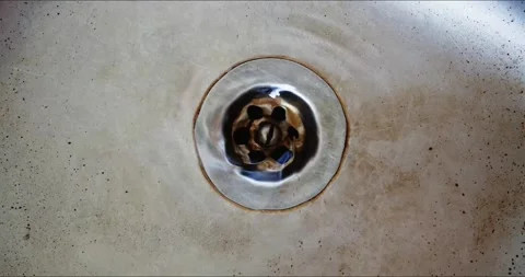 Kitchen sink drain needs cleaning to prevent debris buildup and maintain hygiene Stock-Footage 278027634