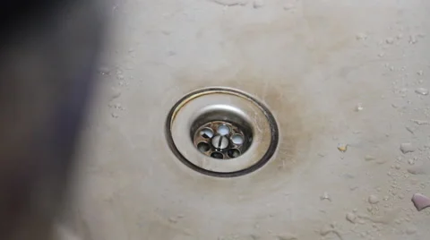 The kitchen sink drained dirty blue water Stock Footage 49545619