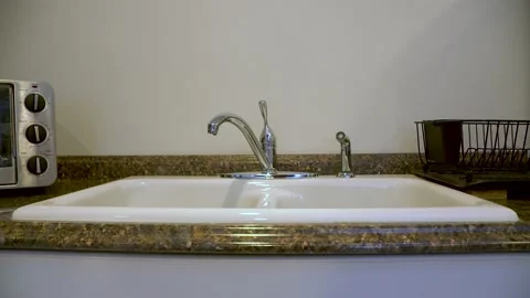 Kitchen Sink Dripping Water Video stock 148162638